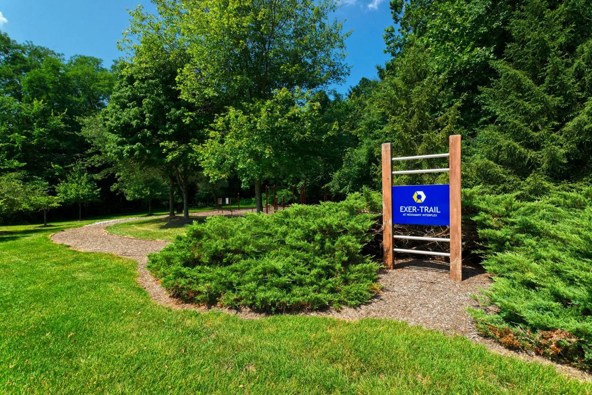 The Exer-Trail fitness path winding through trees on campus
